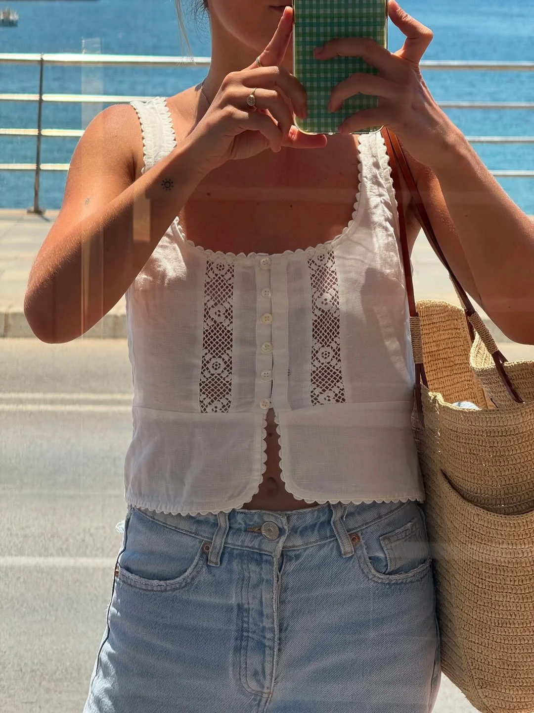 summer beach outfit for women 2026 White Lace Button Top With Light Denim Shorts