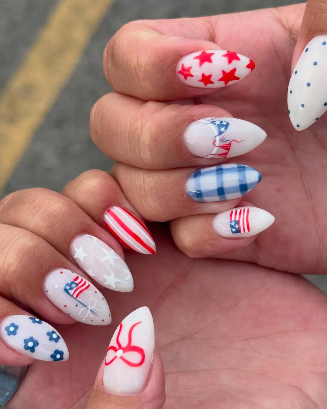 4th of july nails 2026 Playful Americana Almond Nails With Stars, Stripes, and Tiny Florals