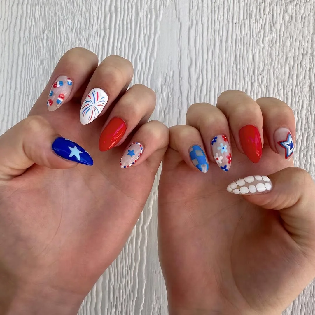 4th of july nails 2026 Mixed Patriotic Almond Nails With Fireworks, Florals, and Checkered Blue