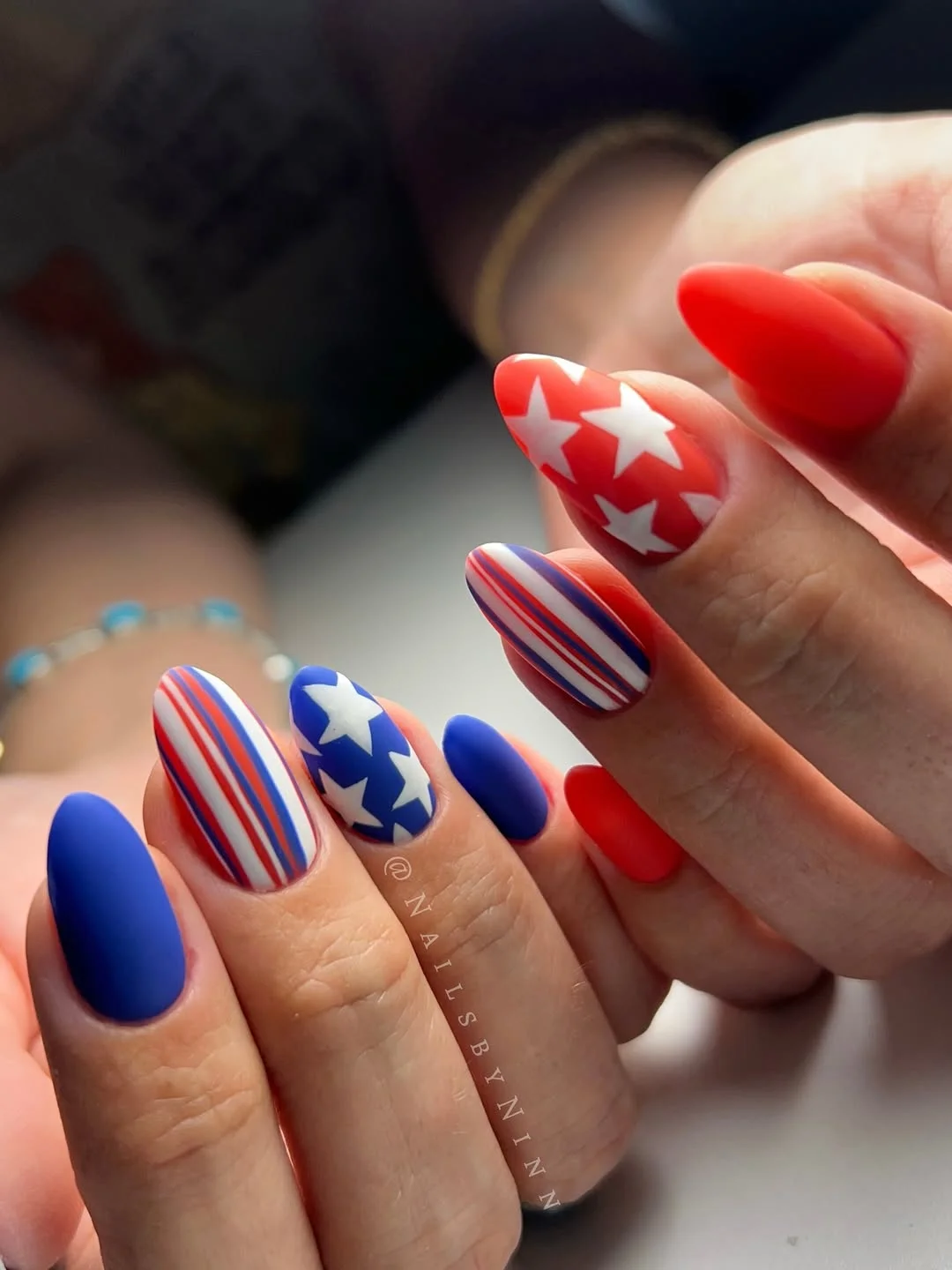 4th of july nails 2026 Matte Red and Blue Almond Nails With Classic Stars and Stripes