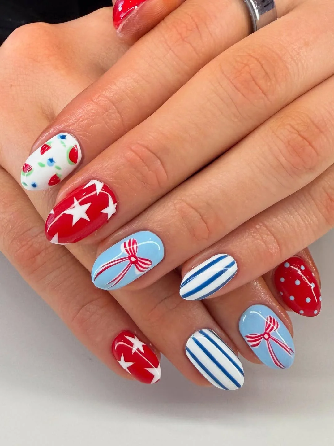 4th of july nails 2026 Sweet Summer Americana Nails With Bows, Strawberries, and Stripes