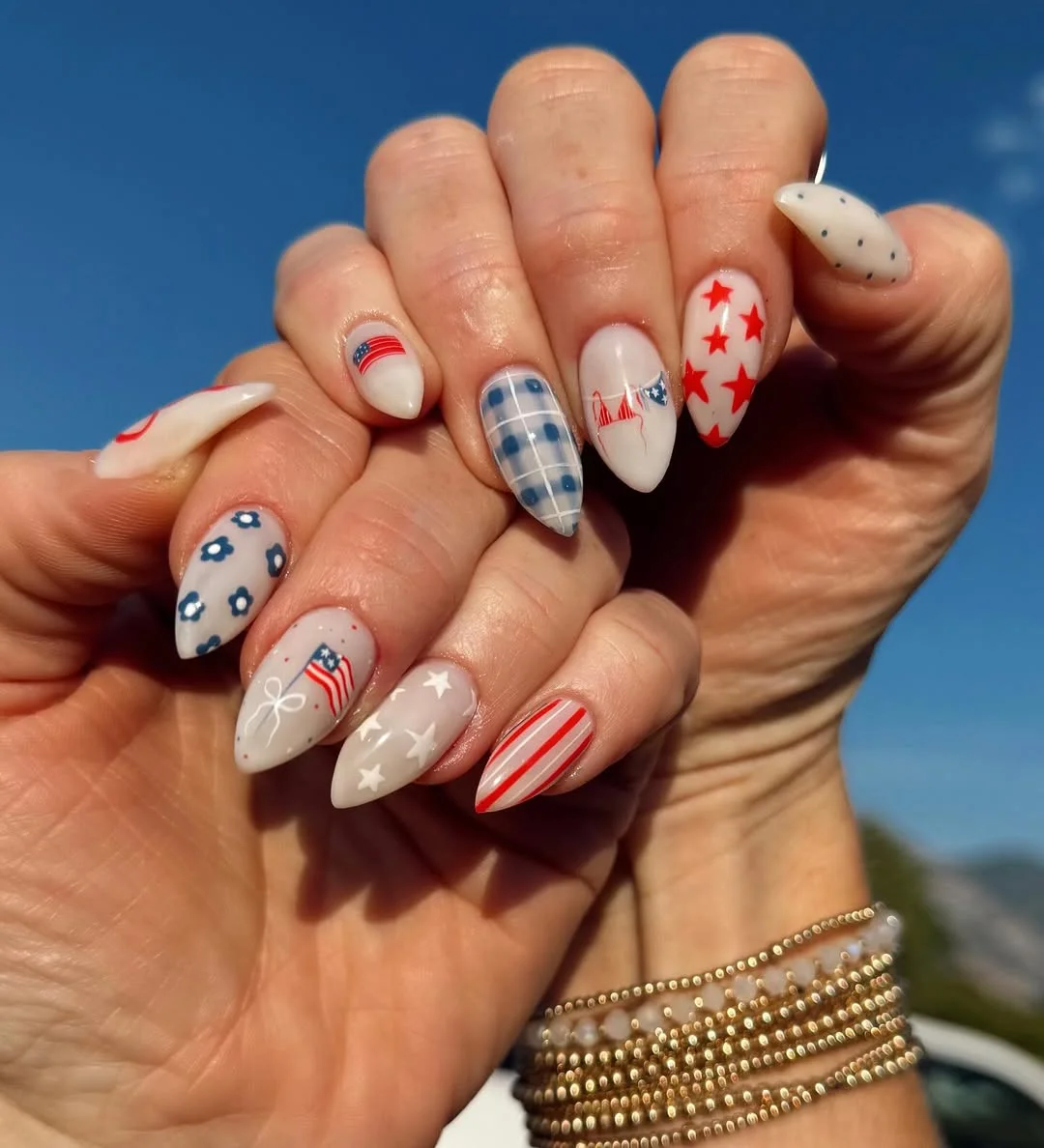 4th of july nails 2026 Soft Americana Almond Nails With Gingham, Flags, and Red Stars