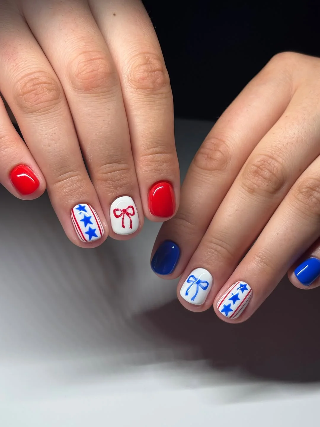 4th of july nails 2026 Easy Short Red White and Blue Nails With Bows and Star Stripes