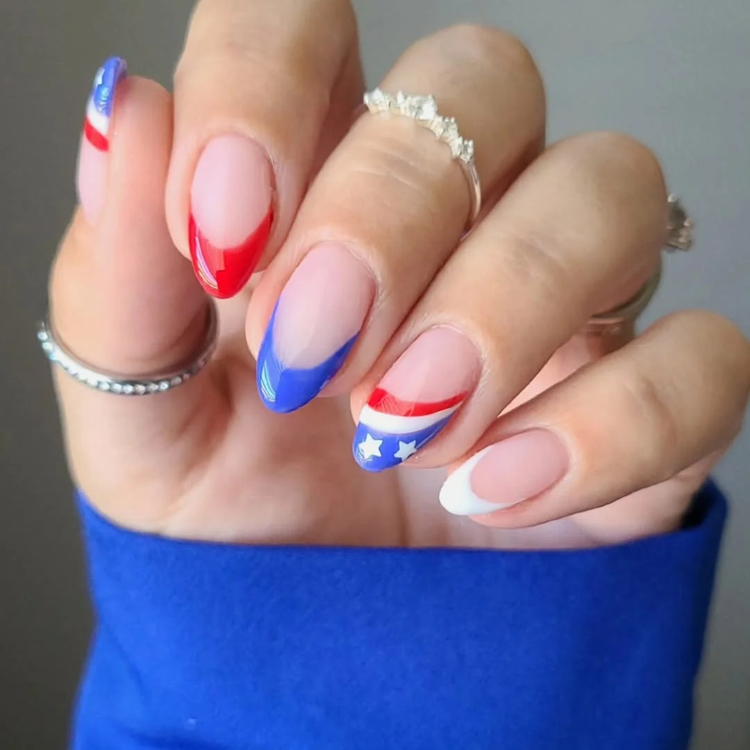 4th of july nails 2026 Minimal Red and Blue French Tips With a Star Accent