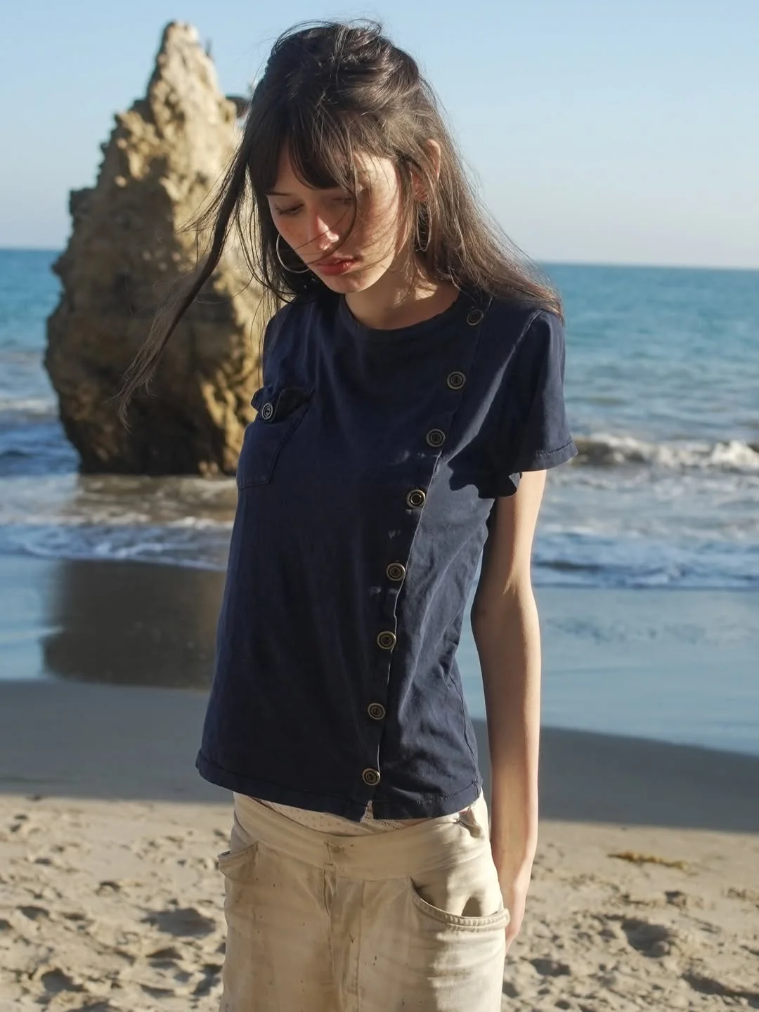 casual summer t-shirt outfit for women 2026 Navy Button-Detail Tee With Cream Beach Pants