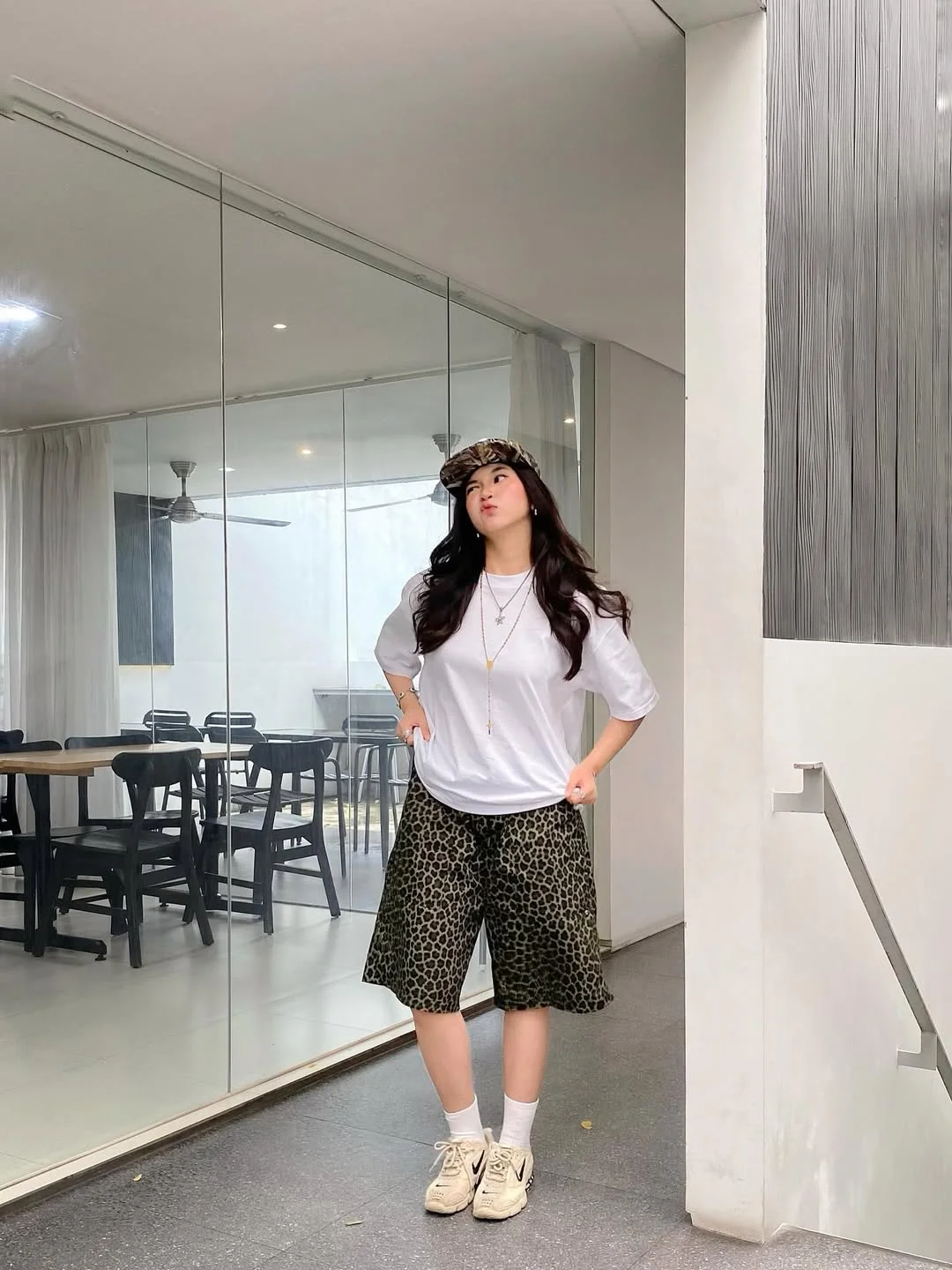 casual summer t-shirt outfit for women 2026 White Tee With Leopard Bermuda Shorts