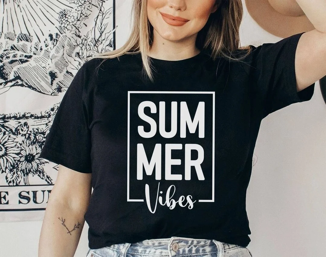 casual summer t-shirt outfit for women 2026 Black Graphic Tee With Light-Wash Denim