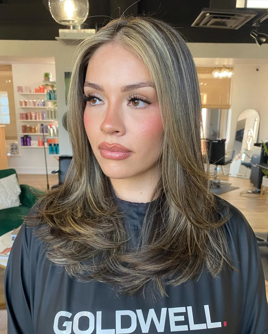 chic summer haircut 2026 Soft Bronde Layers With a Polished Summer Blowout