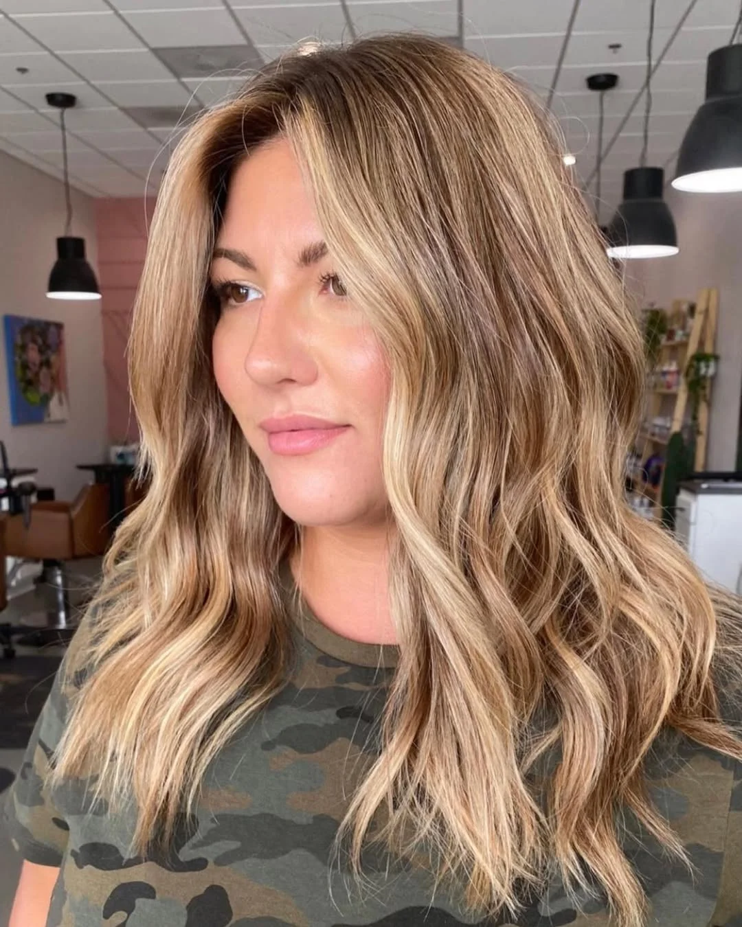 chic summer haircut 2026 Golden Blonde Waves With Soft Face-Framing Movement