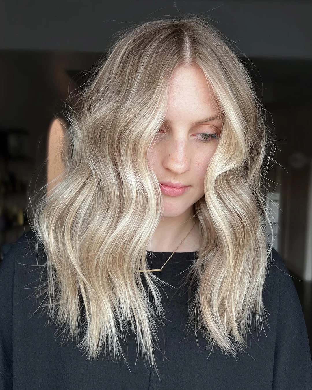 chic summer haircut 2026 Bright Champagne Lob With Airy Beach Waves