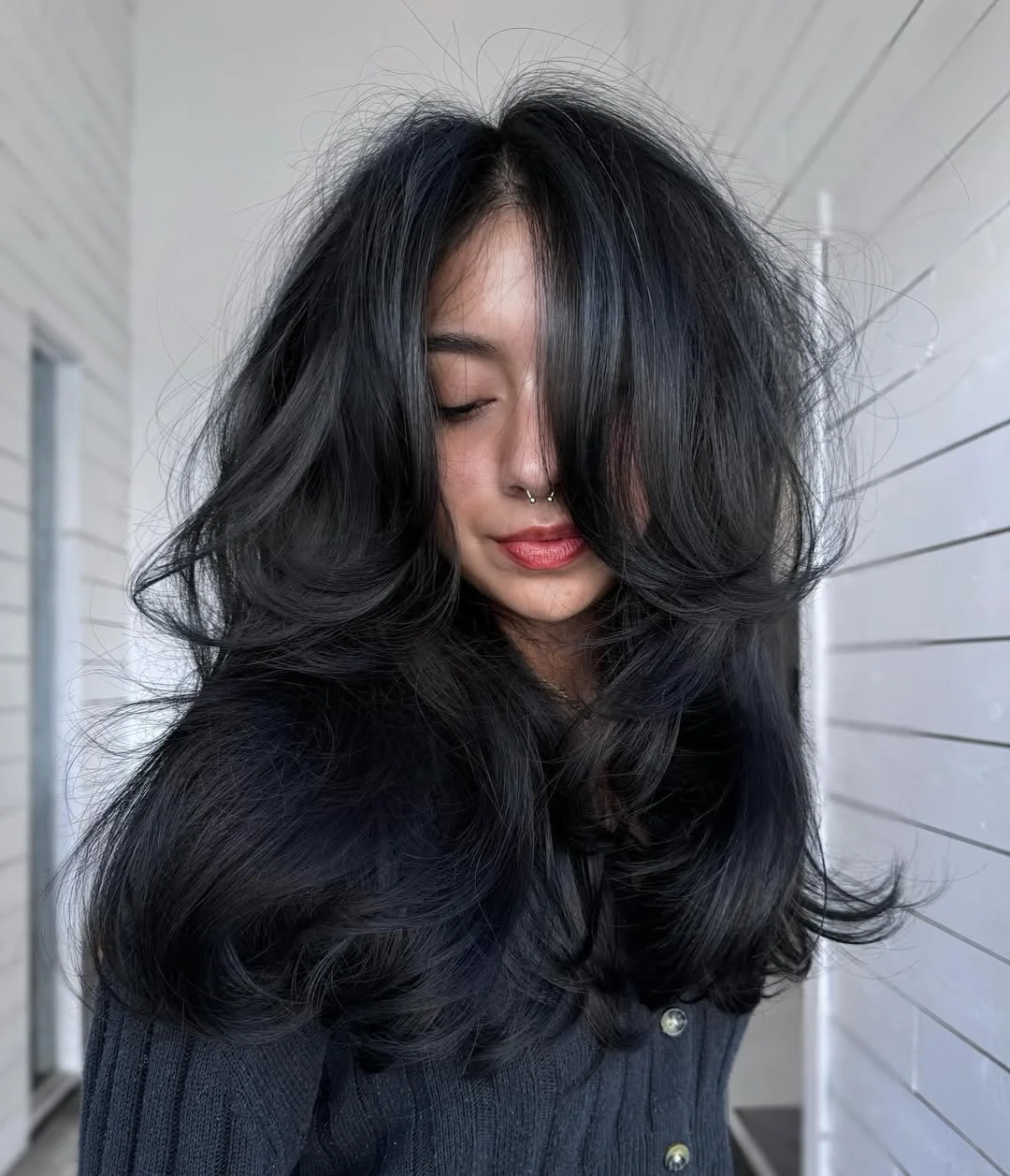 chic summer haircut 2026 Airy Black Butterfly Layers With Dramatic Volume