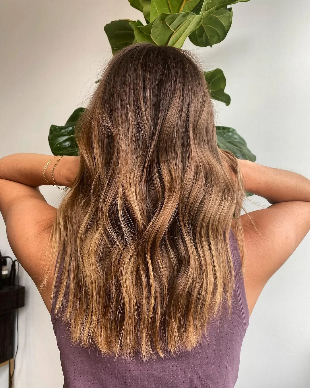 chic summer haircut 2026 Sunlit Bronde Length With Soft Beachy Texture