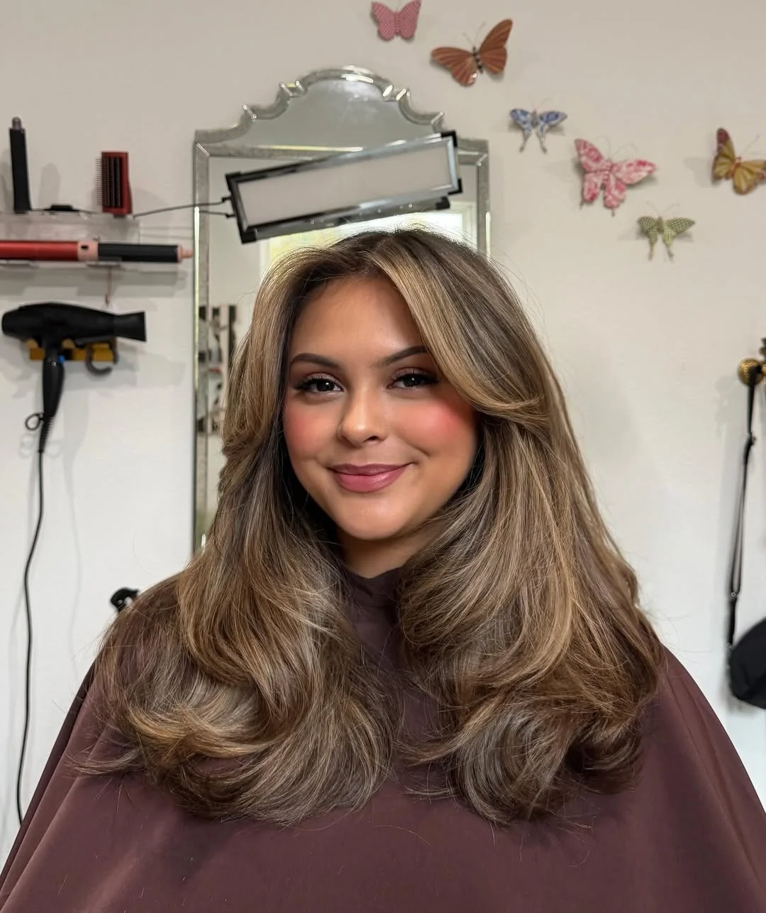 chic summer haircut 2026 Champagne Blonde Volume Layers With Soft Rounded Ends