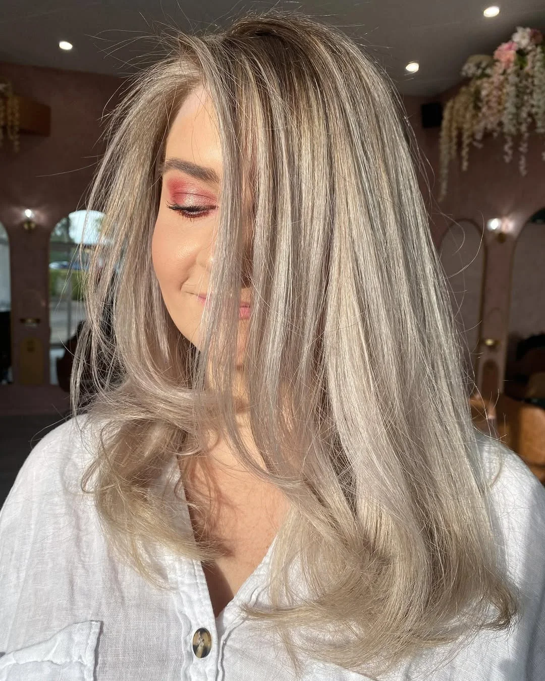 chic summer haircut 2026 Icy Beige Lob With Soft Swooping Layers