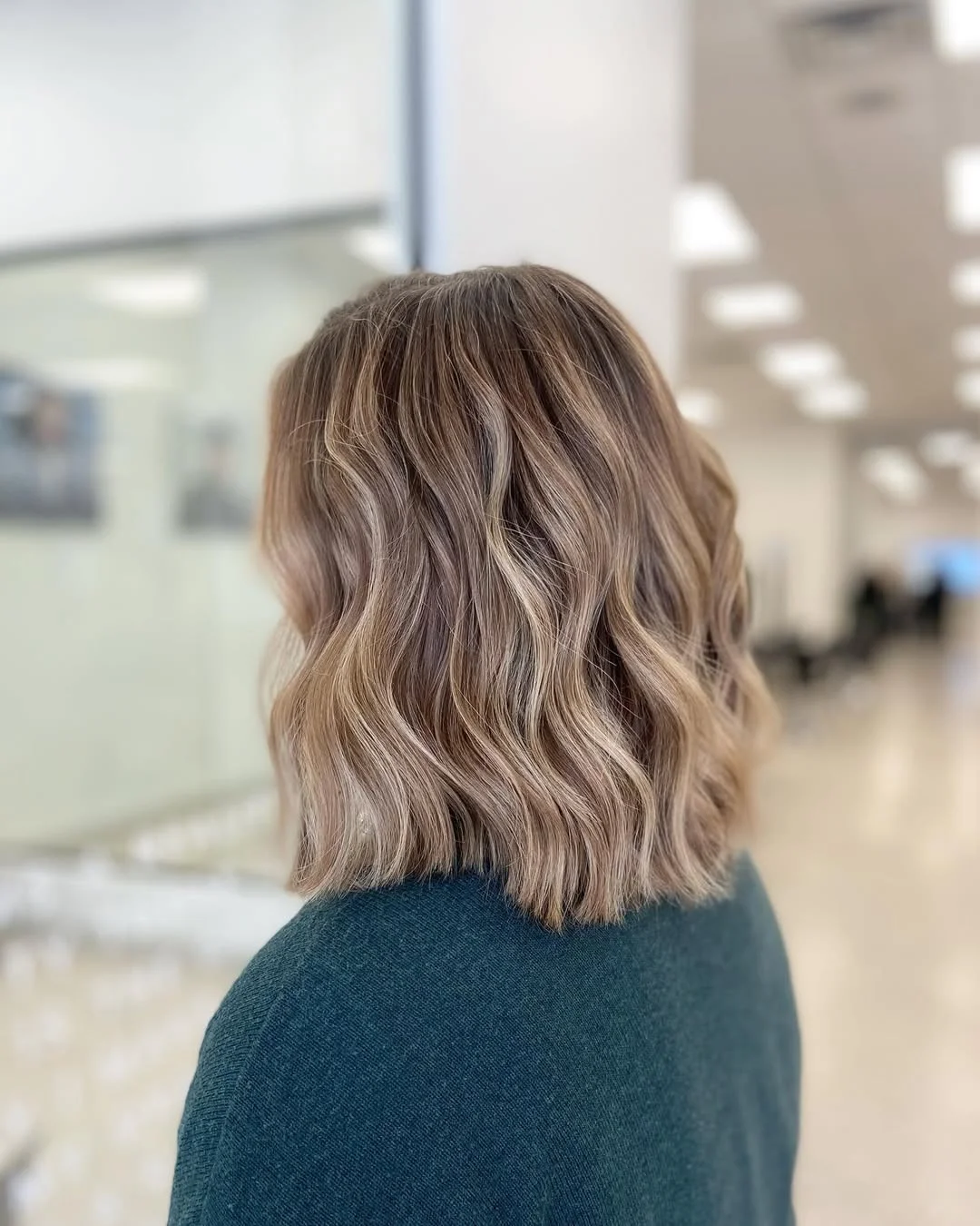 chic summer haircut 2026 Soft Wavy Blonde Lob With Barely-There Texture