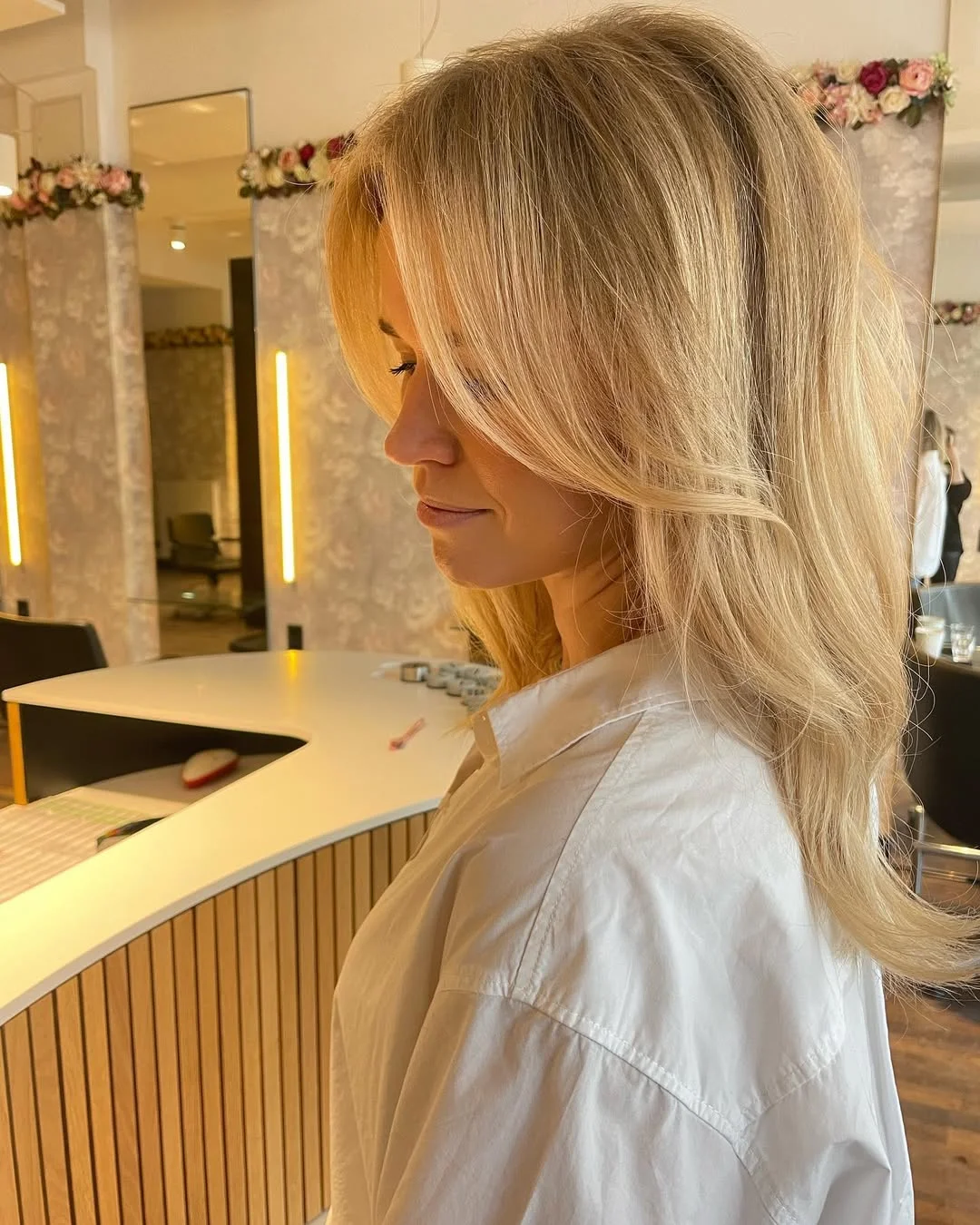 creamy summer blonde hair color 2026 Buttercream Blonde Blowout With Soft Face Layers