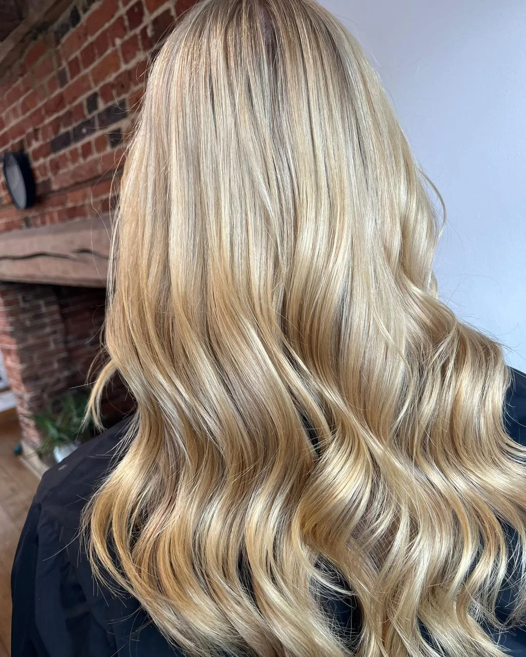 creamy summer blonde hair color 2026 Glossy Champagne Blonde With Soft Golden Ribbons