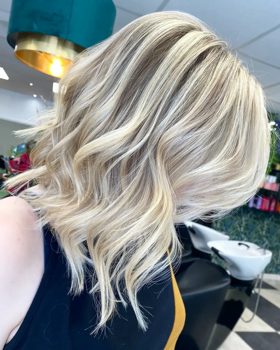creamy summer blonde hair color 2026 Cool Creamy Lob With Textured Bright Pieces
