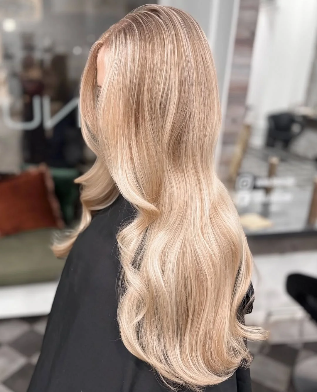 creamy summer blonde hair color 2026 Champagne Cream Blonde With Glossy Waves