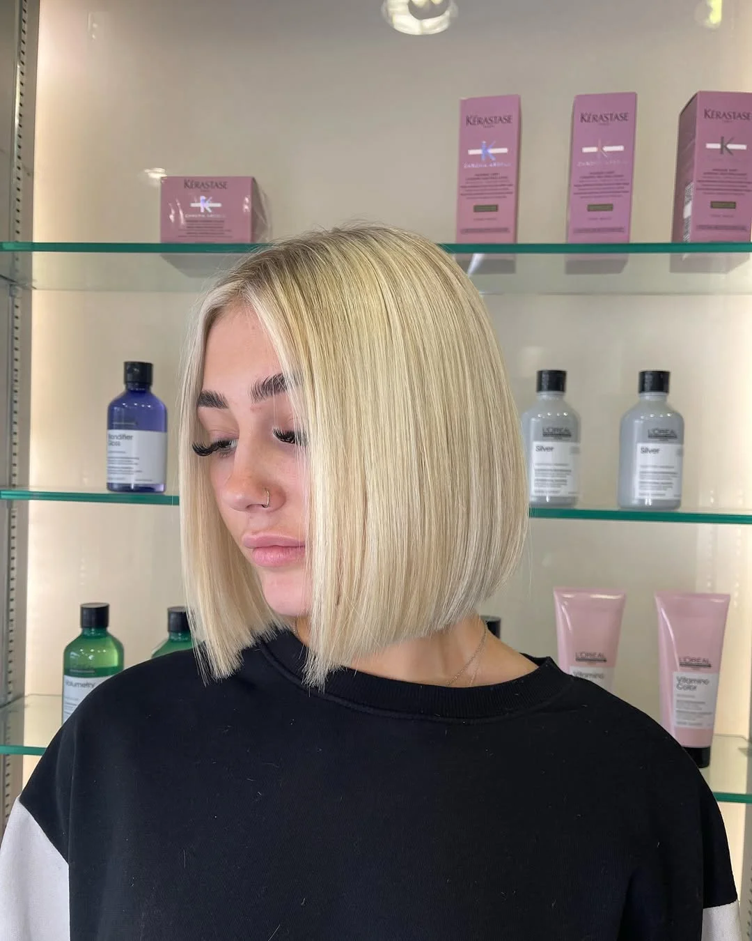 creamy summer blonde hair color 2026 Blunt Cream Bob With Soft Butter Blonde Shine