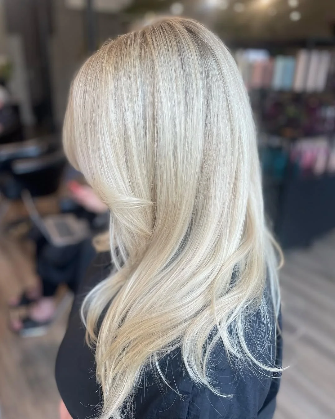 creamy summer blonde hair color 2026 Soft Vanilla Layers With Face-Framing Brightness