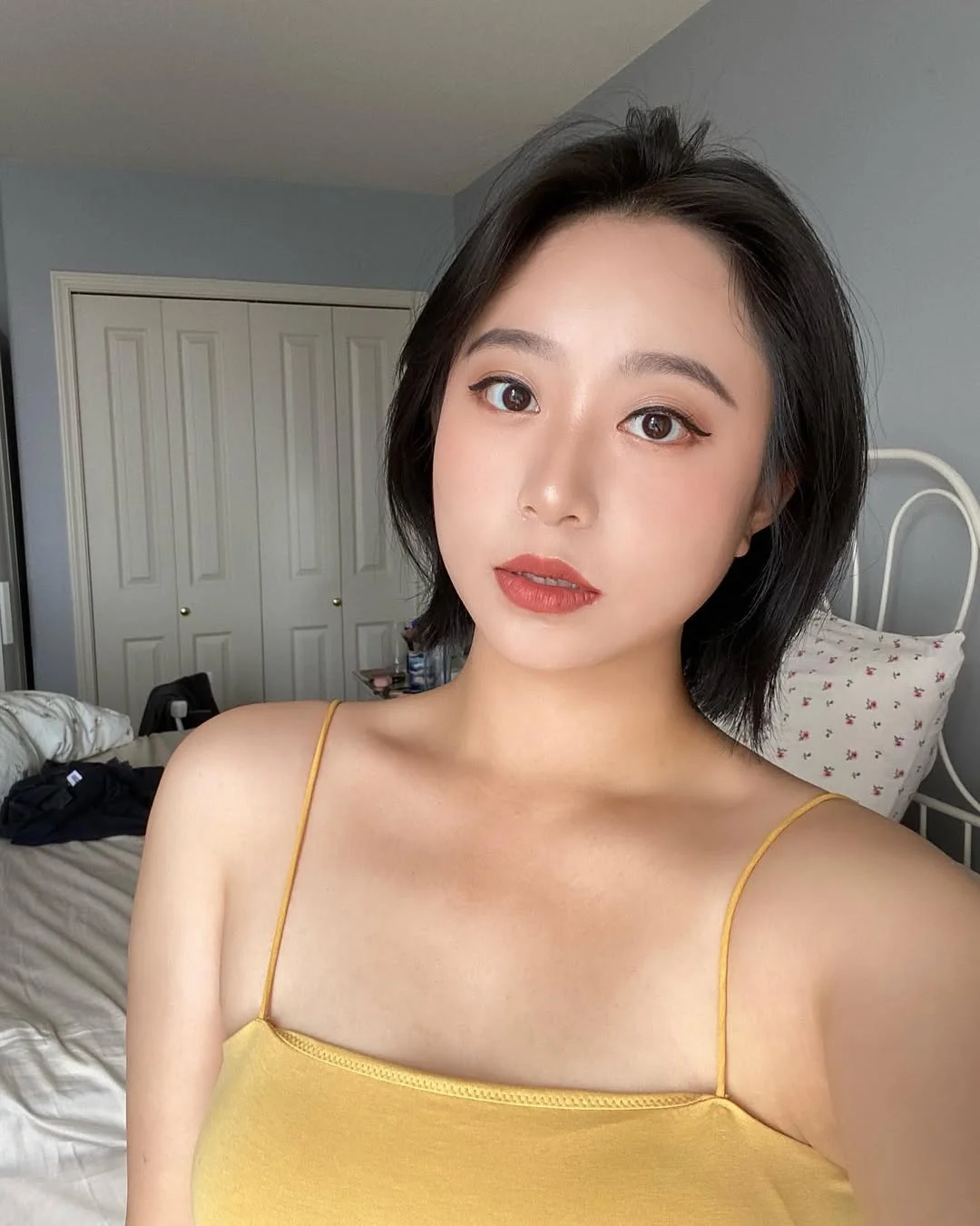 cute summer short haircuts 2026 Airy Short Bob With A Gentle Off-Center Part