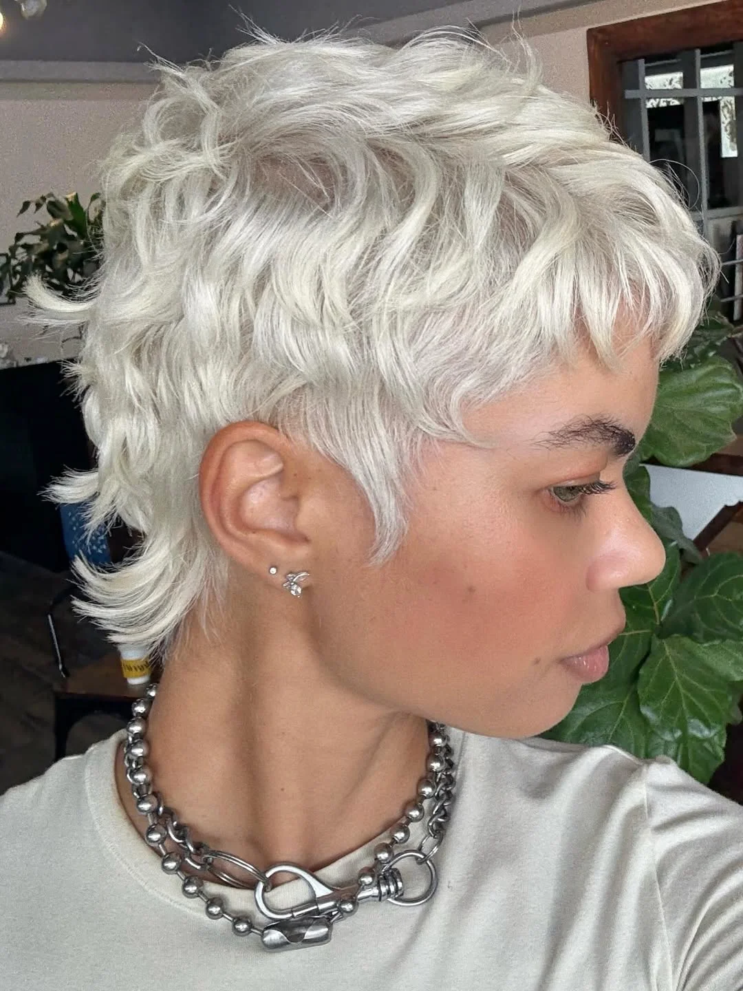 cute summer short haircuts 2026 Platinum Tousled Pixie With Soft Summer Texture