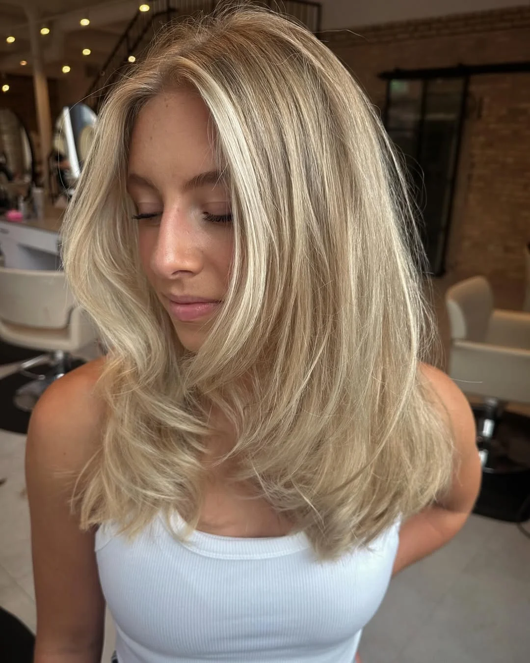 cute summer short haircuts 2026 Soft Blonde Lob With Airy Face-Framing Layers