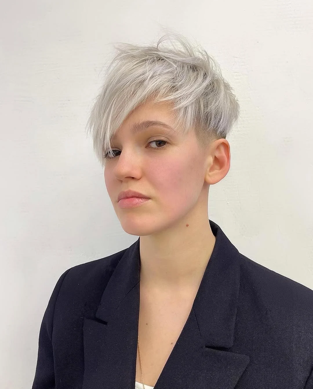 cute summer short haircuts 2026 Icy Textured Pixie With Long Side Bangs