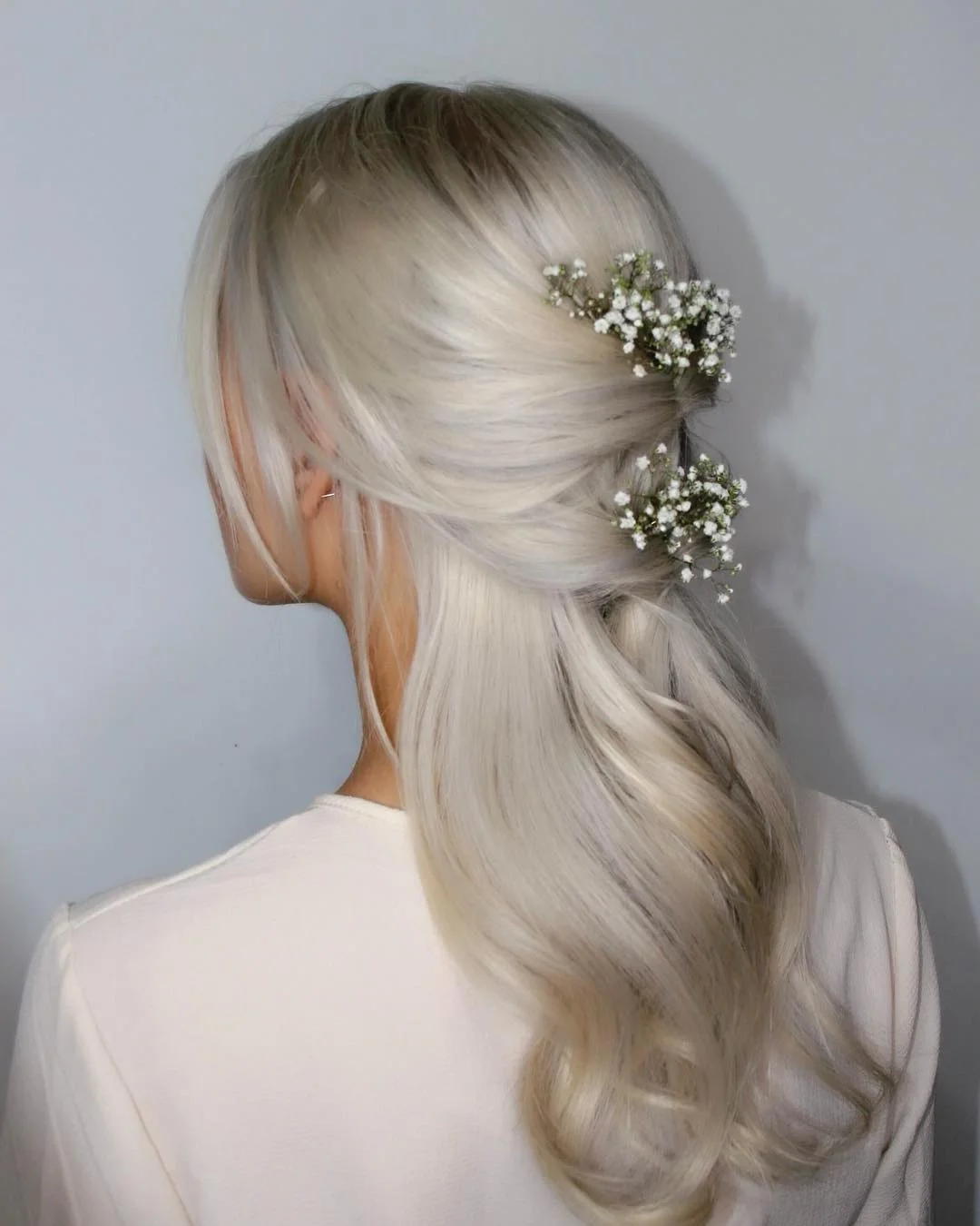easy summer hairstyles ideas 2026 Floral Half-Up Ponytail For A Soft Romantic Moment