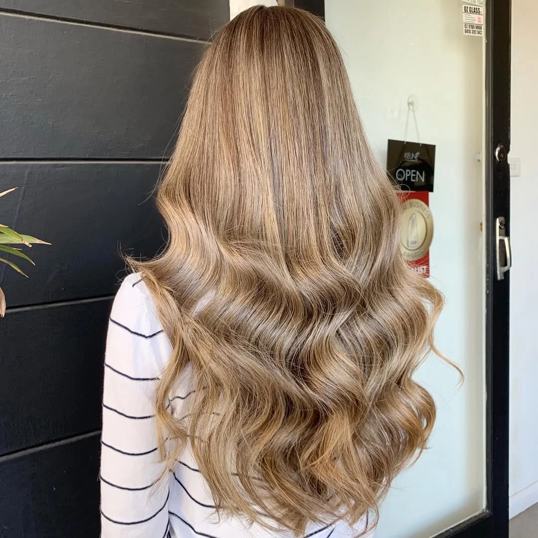 effortless summer easy hairstyle 2026 Long Blonde Waves With A Soft Brushed Finish