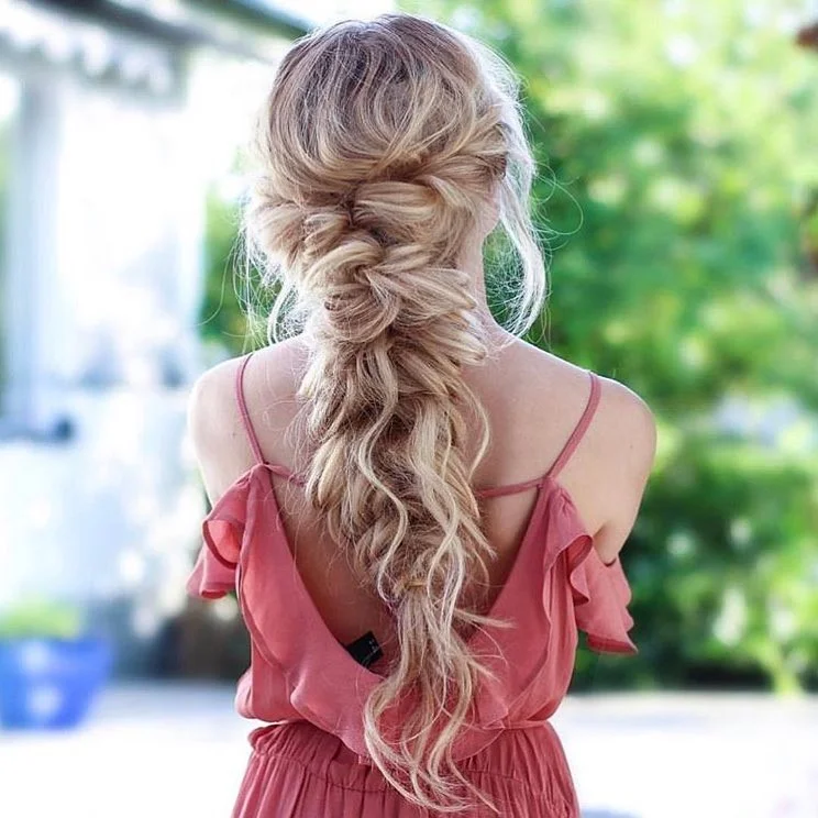 effortless summer easy hairstyle 2026 Loose Braided Ponytail With Romantic Texture