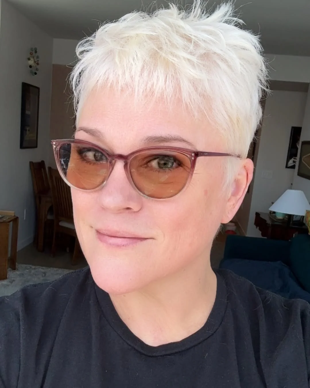 flattering summer haircuts for women over 50 2026 Bright Tousled Pixie With Soft Summer Texture