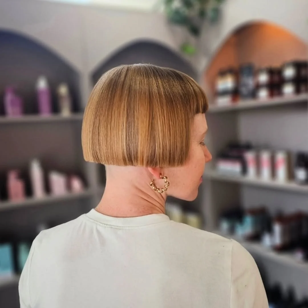 flattering summer haircuts for women over 50 2026 Sharp Micro Bob With Clean Summer Lines