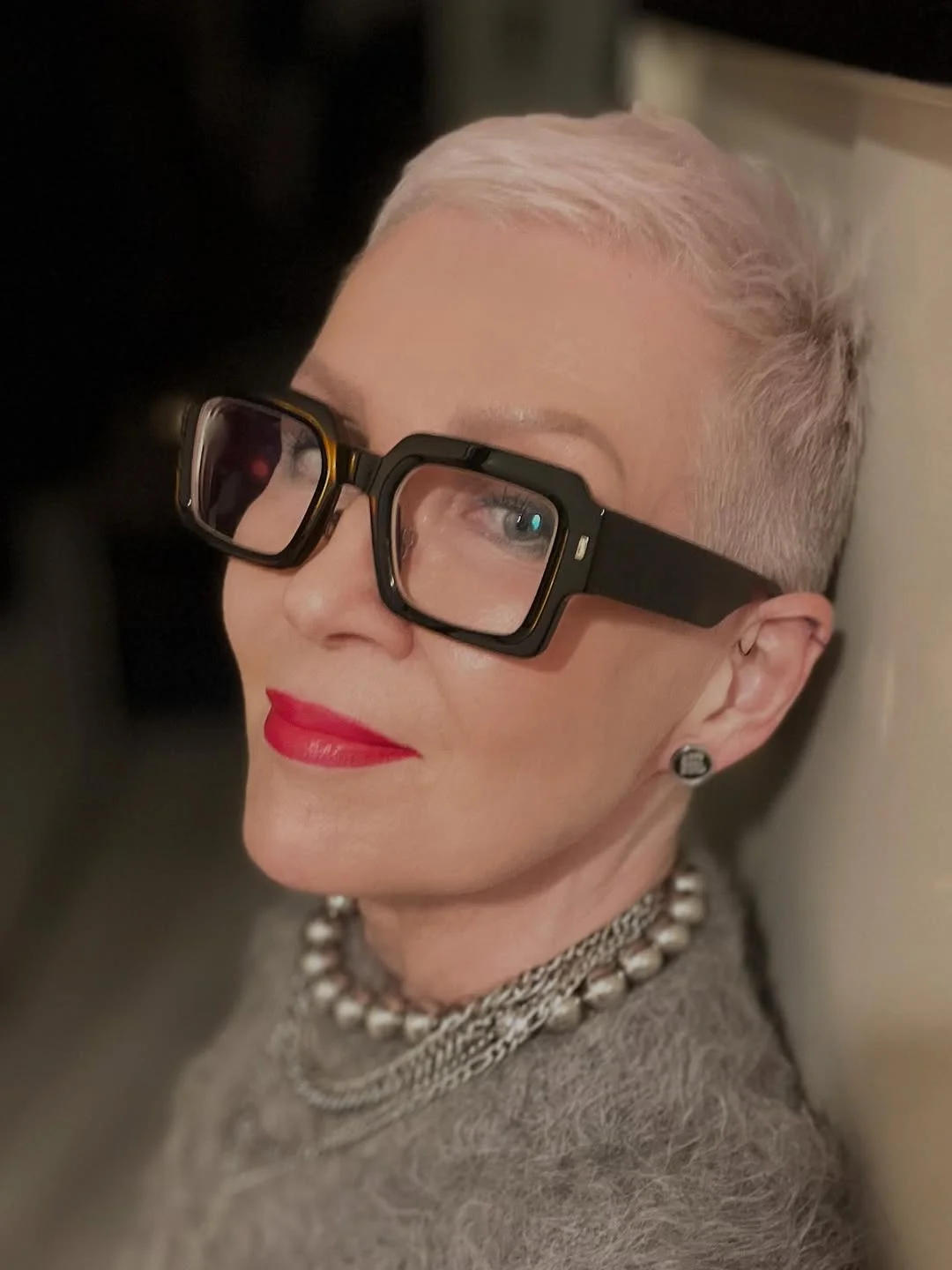 flattering summer haircuts for women over 50 2026 Ultra-Short Platinum Crop With Modern Texture