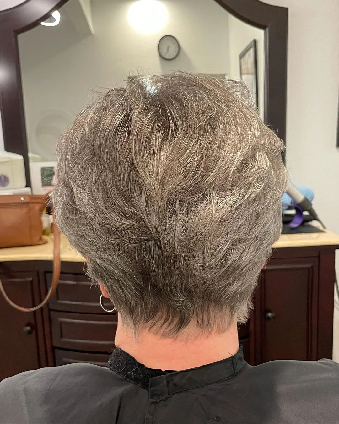 flattering summer haircuts for women over 60 2026 Short Layered Gray Crop With Natural Texture