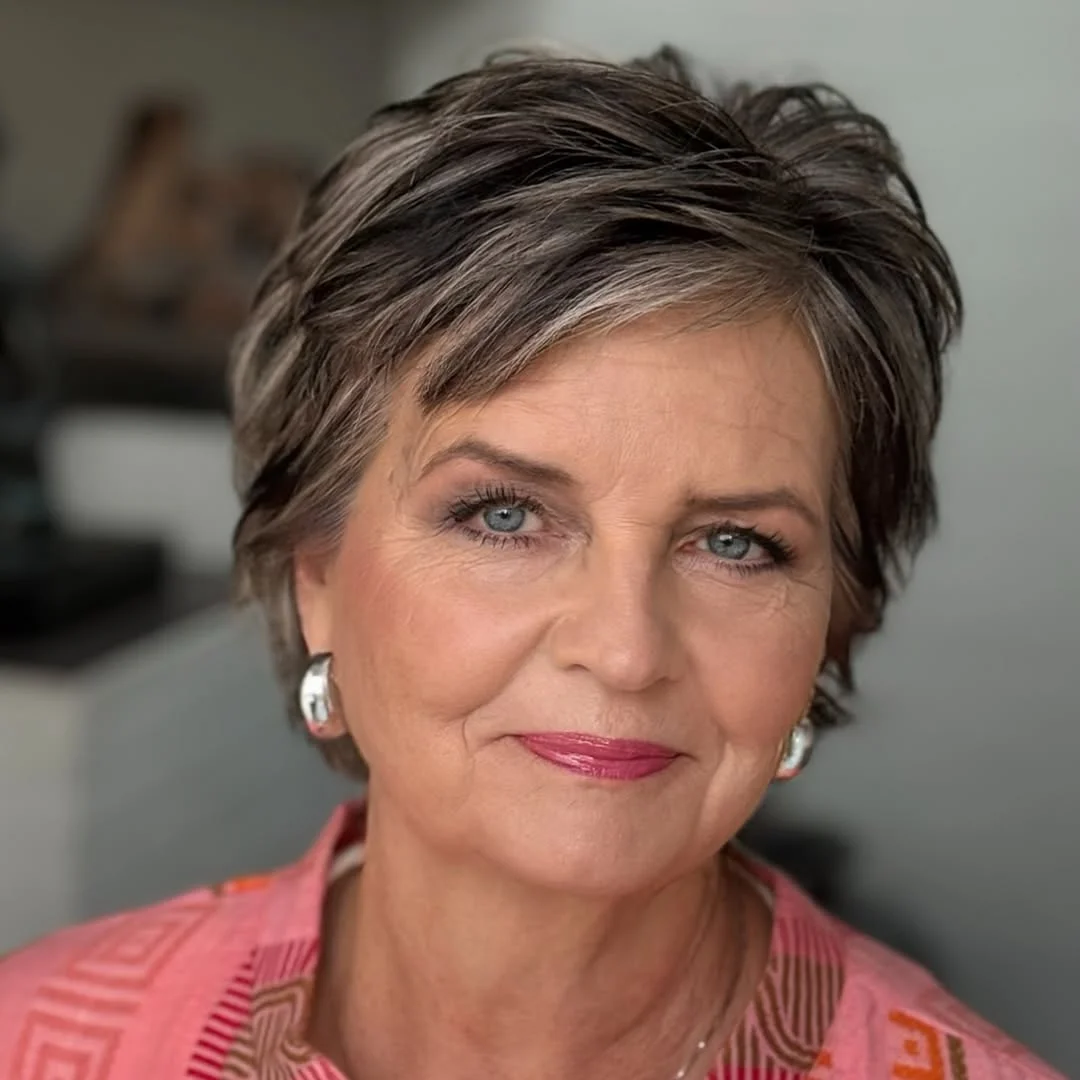 flattering summer haircuts for women over 60 2026 Soft Brunette Pixie With Dimensional Highlights
