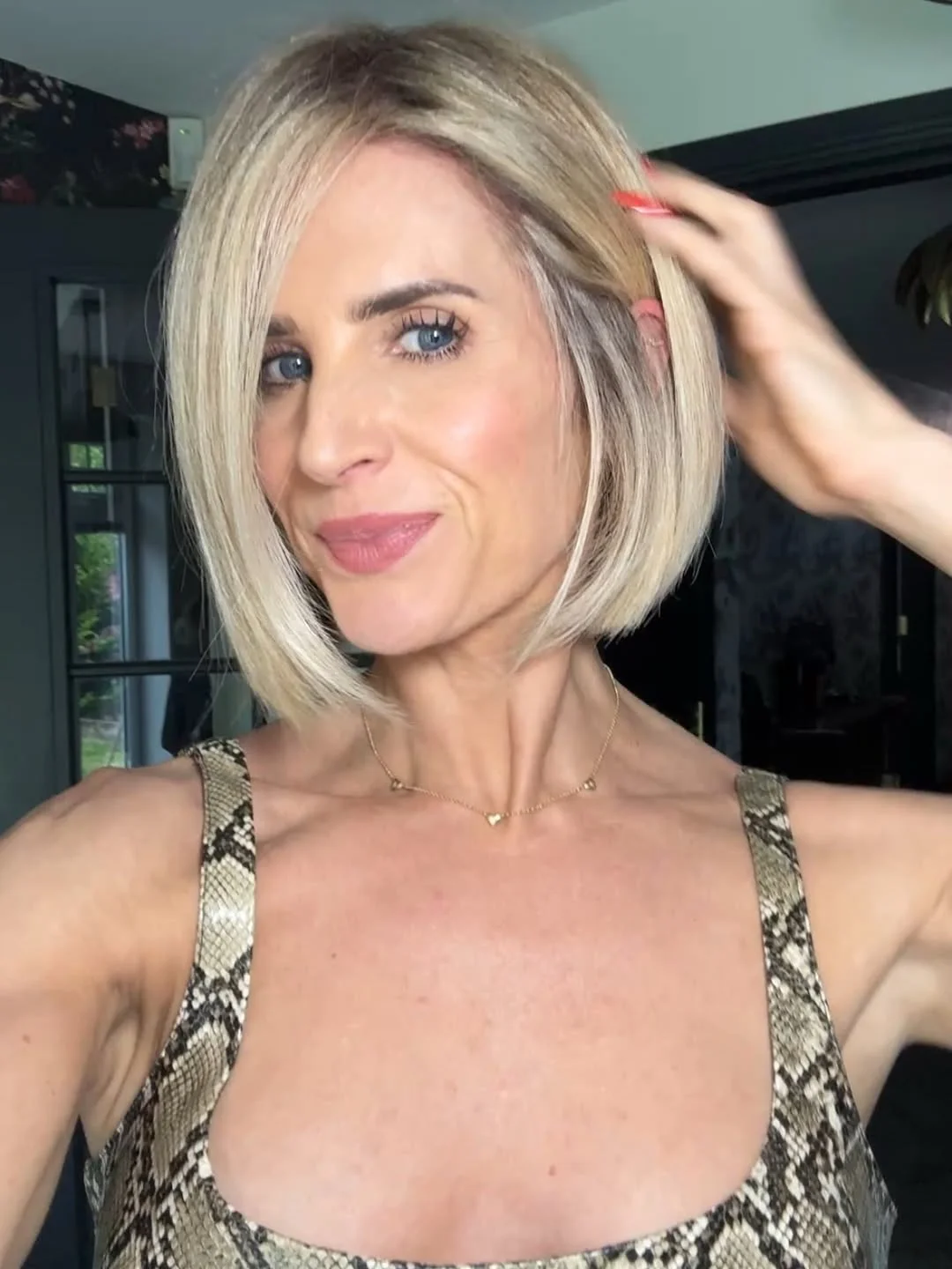 flattering summer haircuts for women over 60 2026 Sleek Blonde Precision Bob