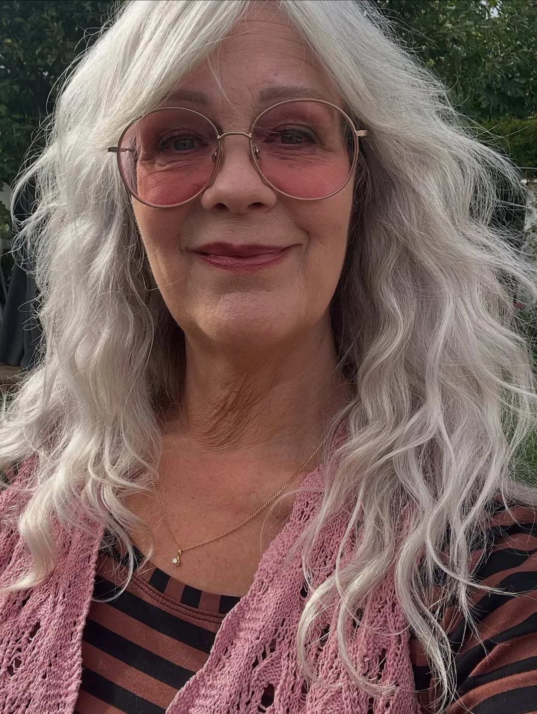 flattering summer haircuts for women over 60 2026 Long White Waves With Soft Summer Movement