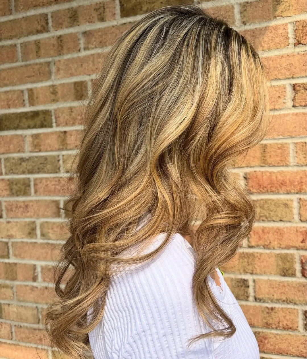 golden summer honey blonde hair color 2026 Golden Caramel Honey Blonde With Soft Dimension