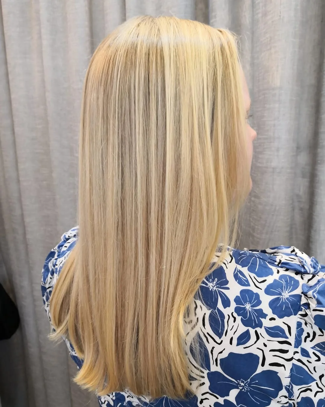 golden summer honey blonde hair color 2026 Clean Vanilla Honey Blonde With Sleek Lengths