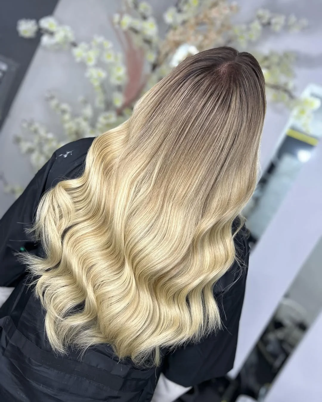golden summer honey blonde hair color 2026 Rooted Honey Blonde Waves With a Soft Melt