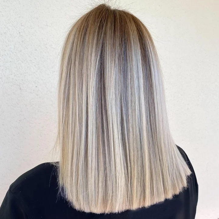 golden summer honey blonde hair color 2026 Blunt Honey Blonde Bob With Cool Beige Dimension