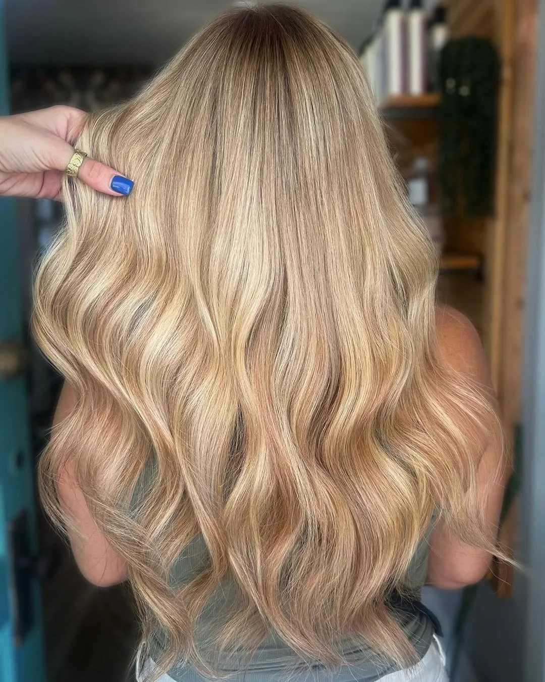 golden summer honey blonde hair color 2026 Creamy Honey Blonde Waves With Soft Shadow Roots