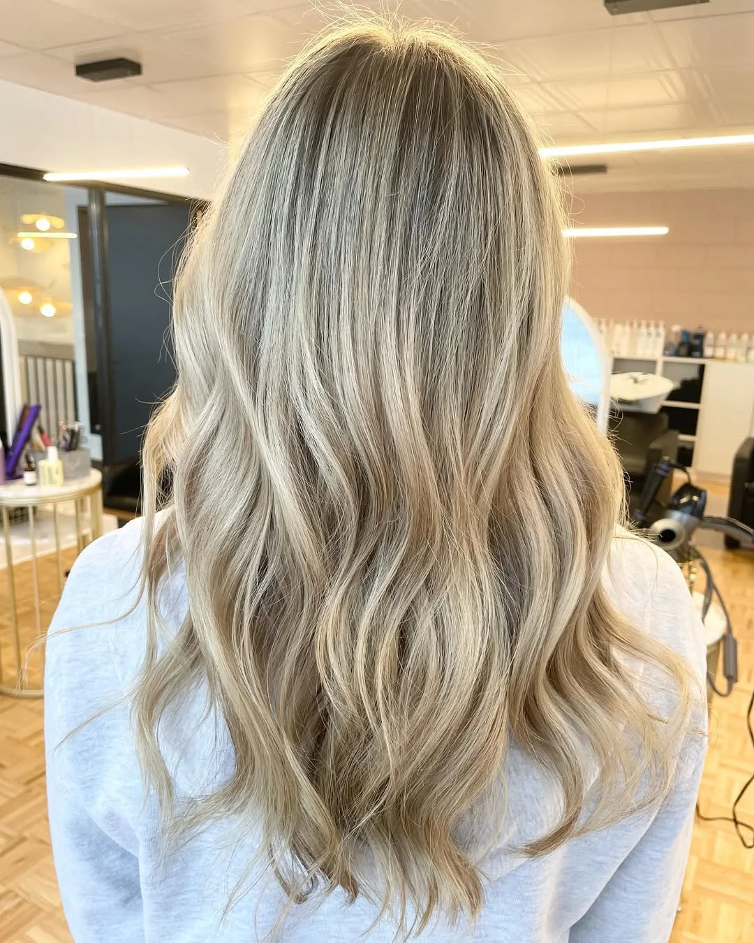 golden summer honey blonde hair color 2026 Muted Honey Blonde With Beige Summer Shine