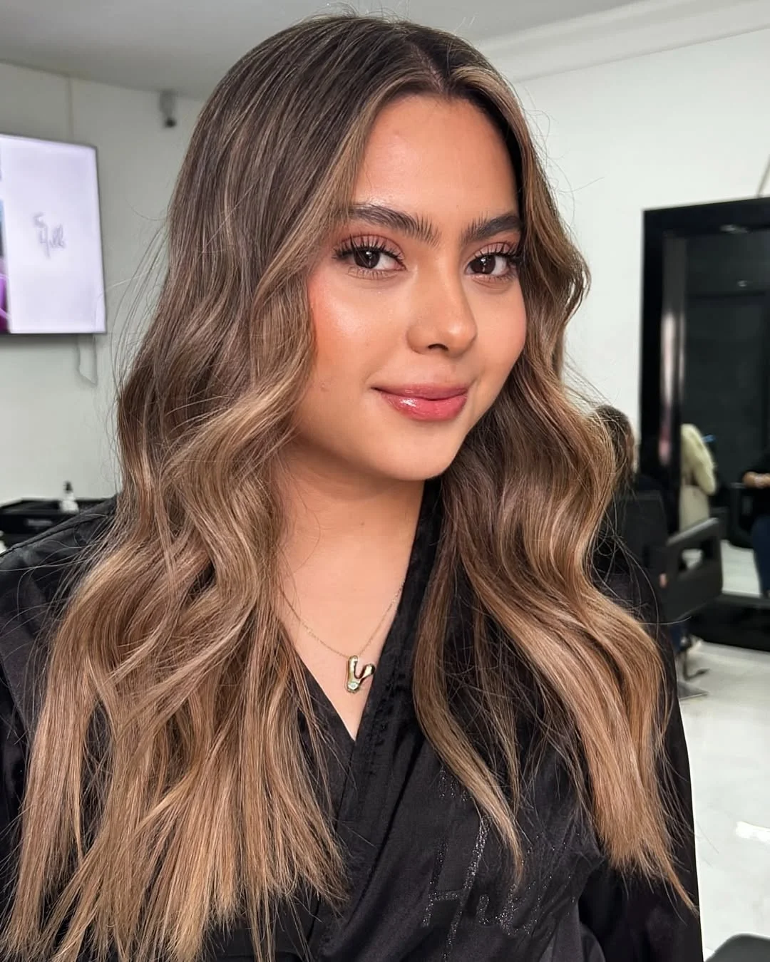golden summer honey blonde hair color 2026 Soft Brunette Honey Balayage With Glossy Waves
