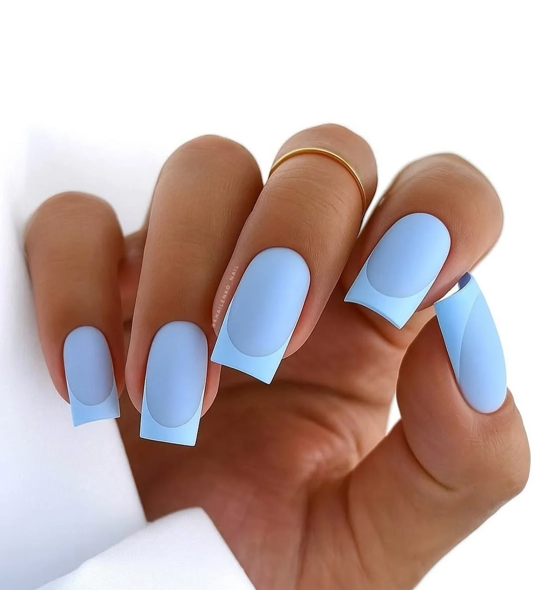light summer nails 2026 Matte Light Blue Square Nails With A Modern French Curve