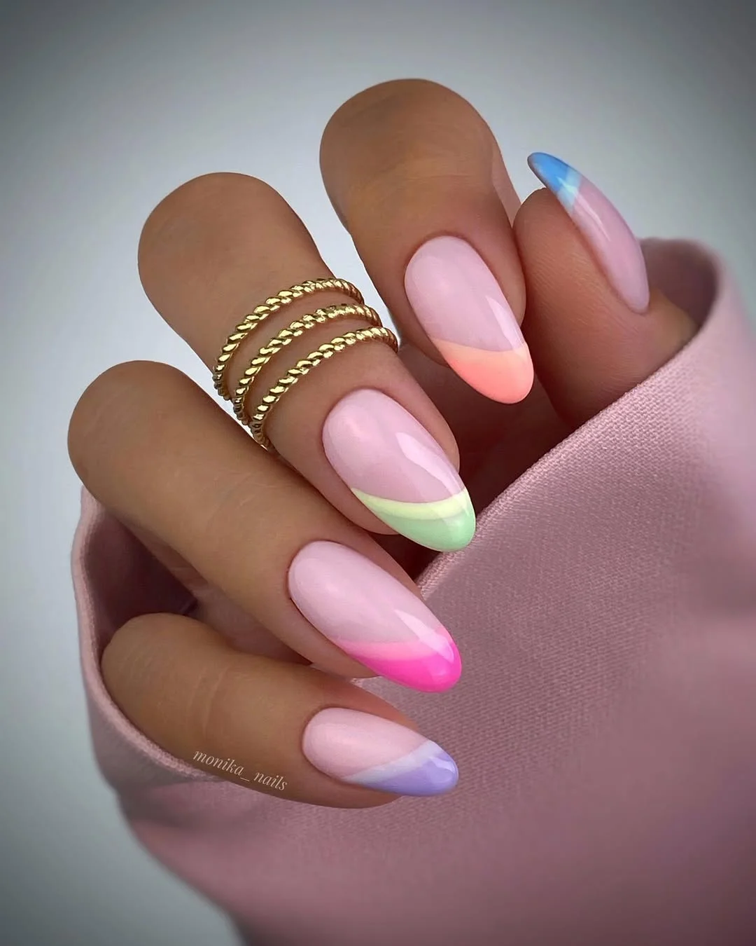 light summer nails 2026 Pastel French Almond Nails With Pink Green Purple And Blue Tips