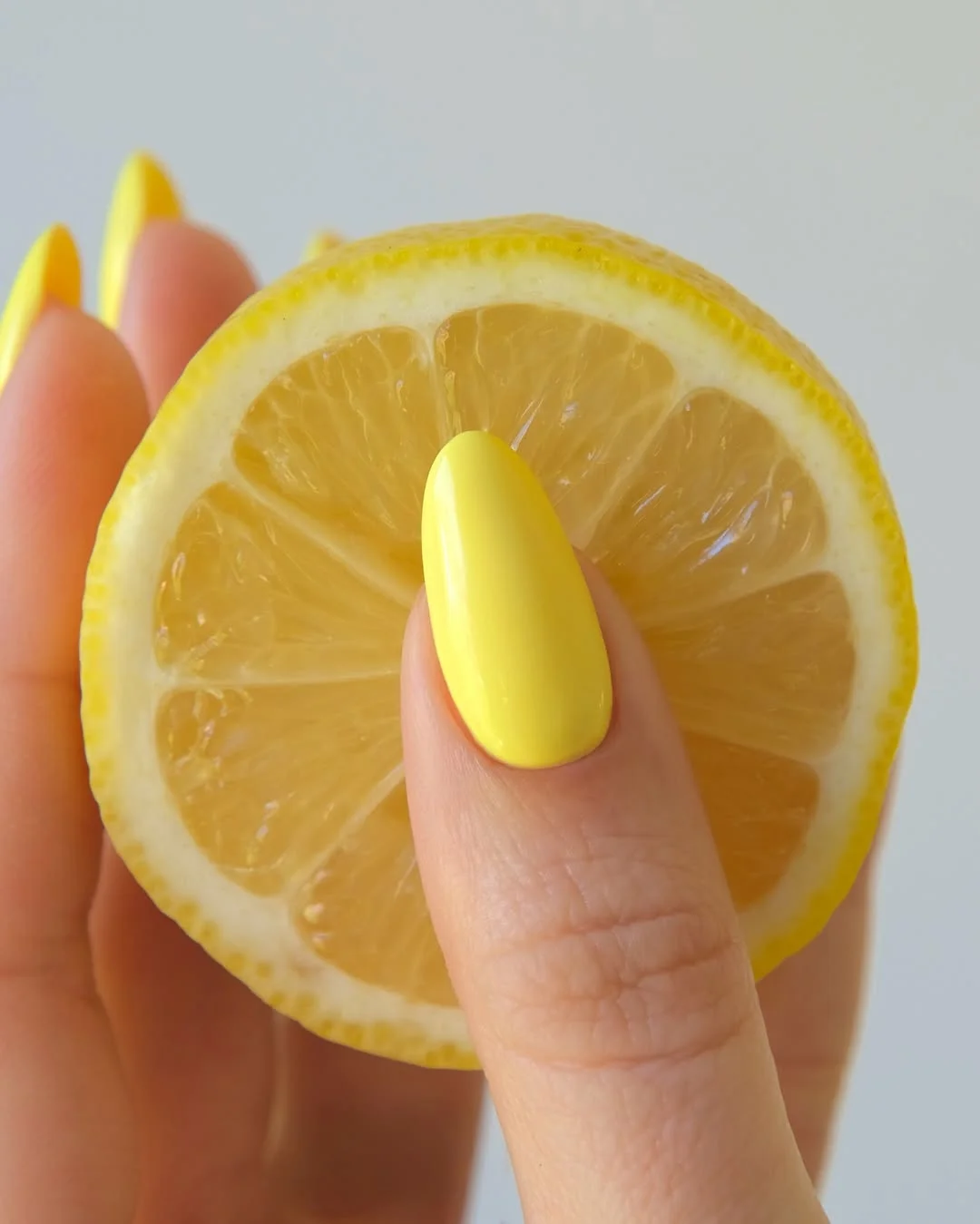 light summer nails 2026 Lemon Yellow Almond Nails With A Clean Citrus Finish