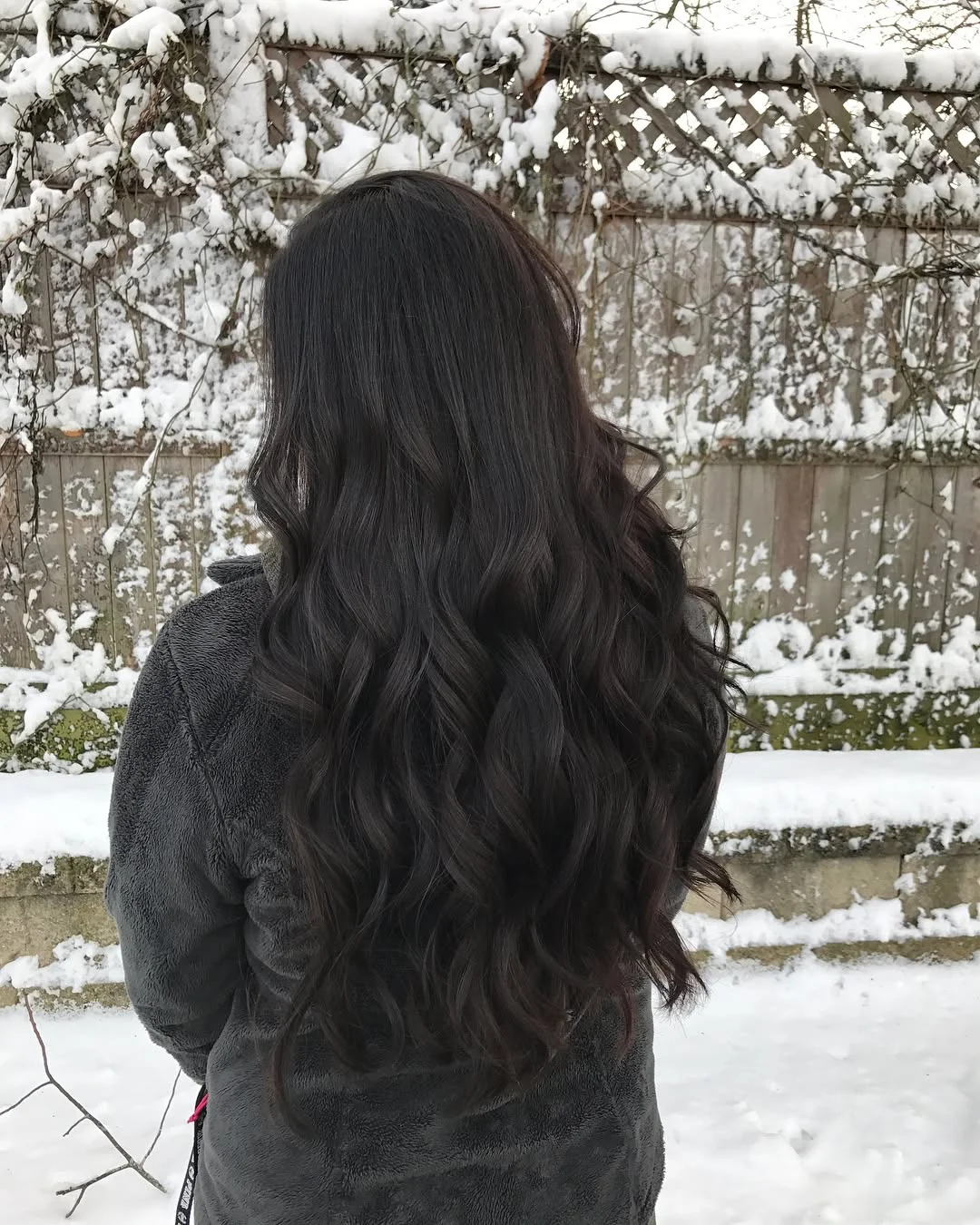 low maintenance summer hair color for brunettes Soft Black Brunette With Velvety Waves